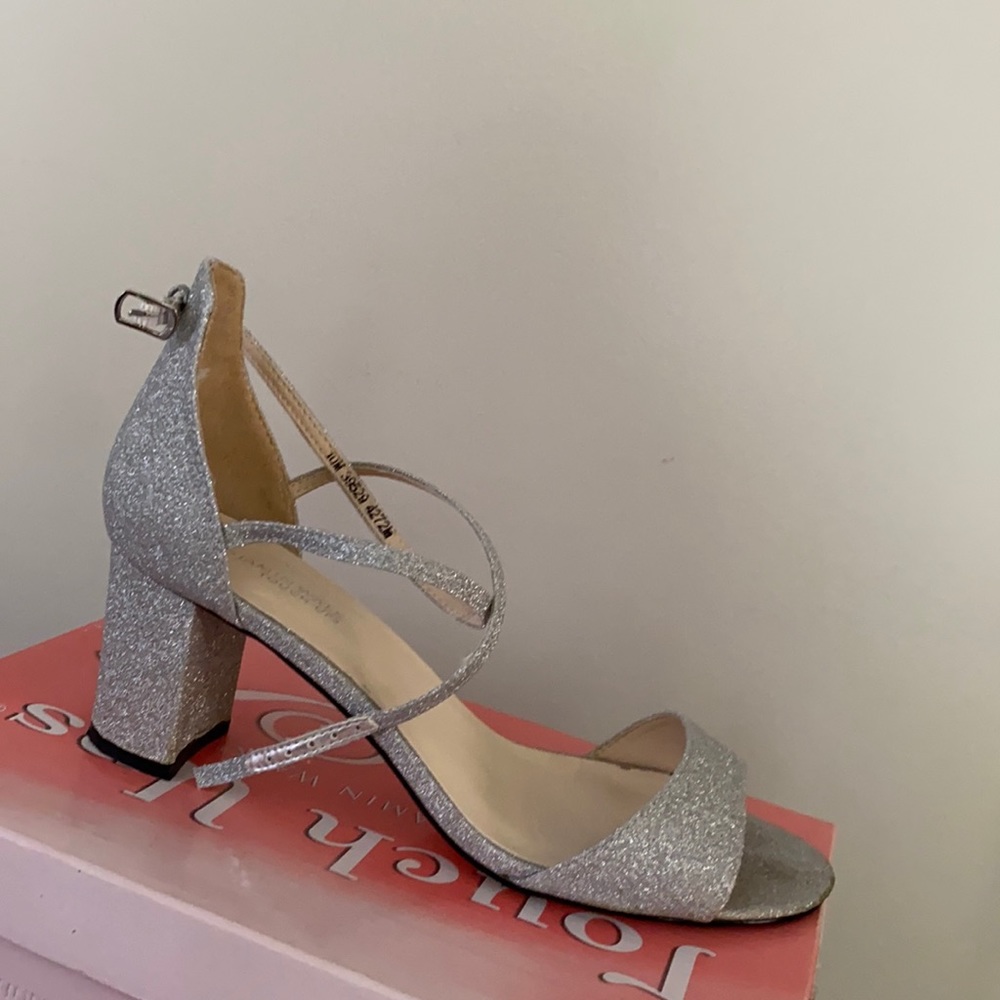Size 10 High heels silver. Heel height is 2 1/4 inches.